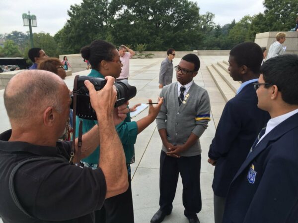 Senior Keyon Whyte is is interviewed by Newsday reporter.